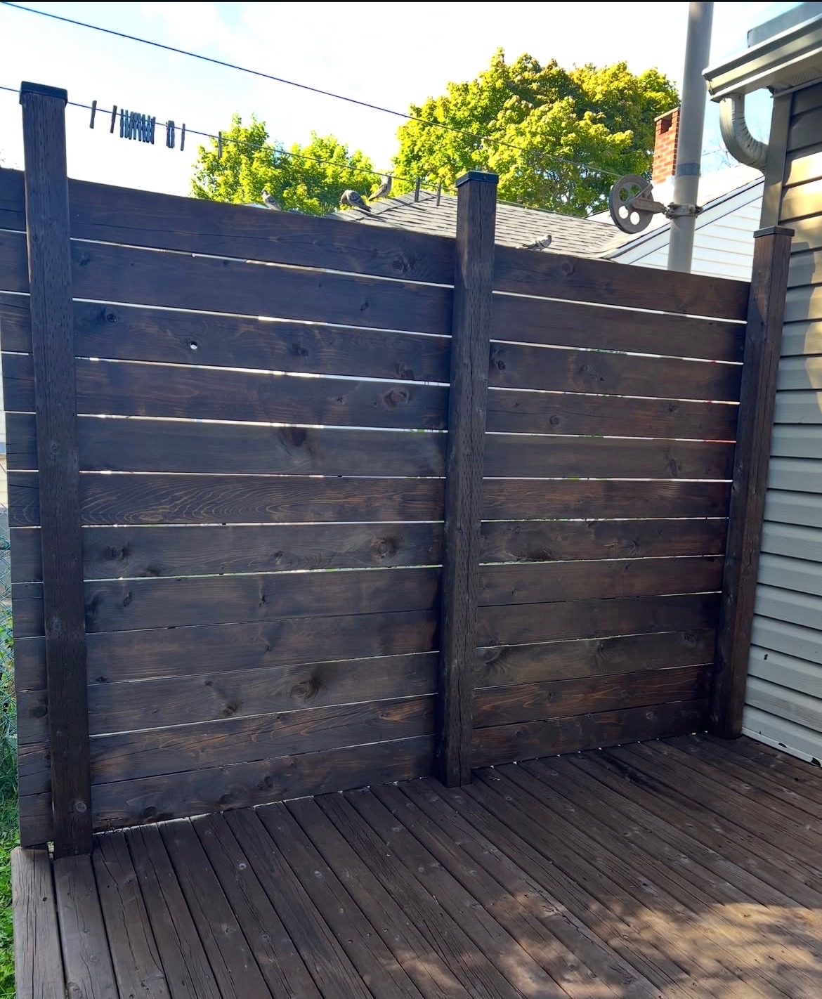 Pressure washed and stained fence